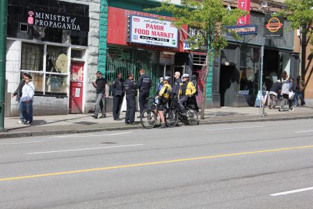 Police watch [Photo: Tami Starlight]