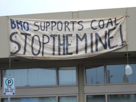 Banner dropped from BMO Branch in Courtenay