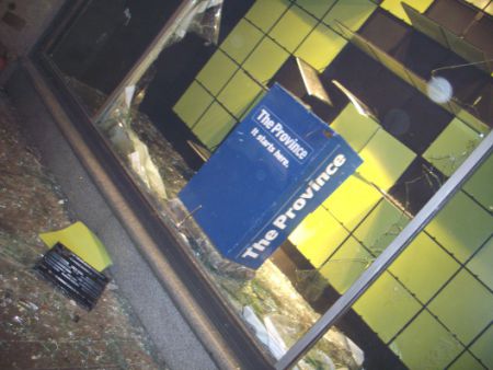 Heart Attack 2010 deja vu: Province newspaper box in smashed out windows of Hudson's Bay