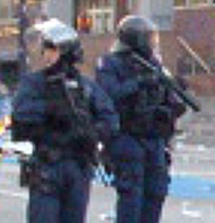 VPD public order unit members during Canucks riot, armed with M4 and Arwen