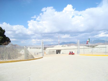 Entrance to the mine. Locals removed the Canadian flag at the gate during the occupation, it was never replaced. Photo by Dawn Paley.