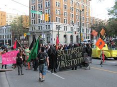 Vancouver Mayday 2014 Confronts Pipelines and Pigs