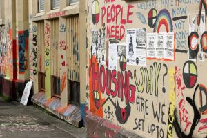 DTES Residents march through streets and paint the site of future Aboriginal Healing and Wellness Centre 