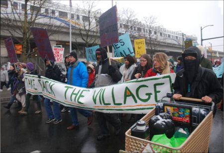 Marching Toward the Olympic Village  [Photo: Murray Bush]