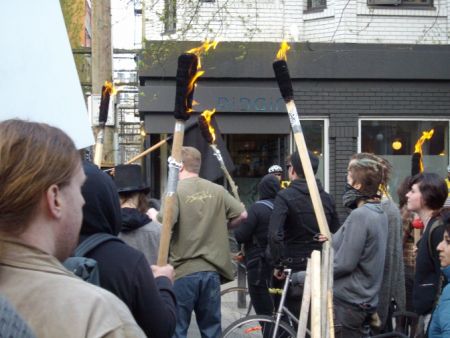 Torches blaze outside Pidgin. Torches blaze outside Pidgin.