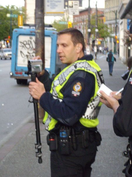 Camera crew from the Public Safety Unit (PSU) filming protesters. Camera crew from the Public Safety Unit (PSU) filming protesters.