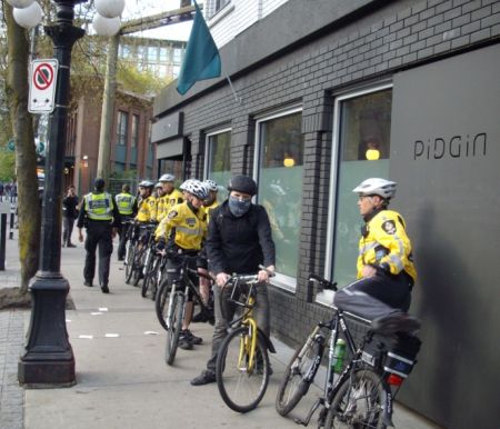 Cops line up to protect Pidgin restaurant. Cops line up to protect Pidgin restaurant.