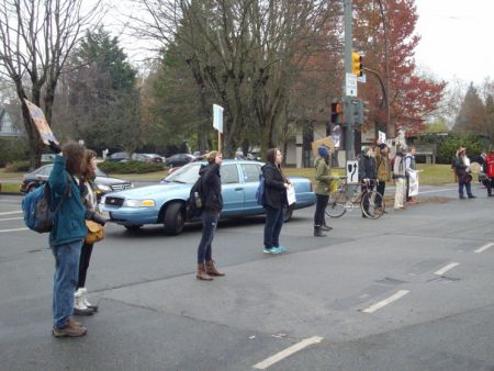 Another view of the circle at University and Westbrook, with blue unmarked RCMP vehicle lurking in the background.