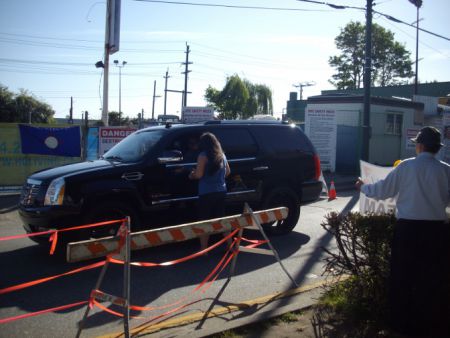 Hannding out flyers to drivers.