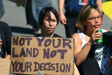 "Not your land, not your decision". Unist'ot'en rally and set up a permanent camp to block proposed pipelines on their land. photo: Ben Powless