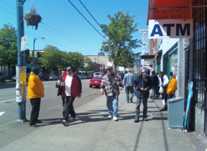 CSC security guards, in yellow, on Hastings Street // VMC