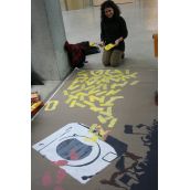 Alejandra enjoying her creativity with the banner