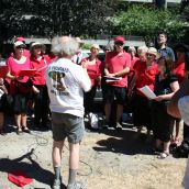 warming up with the choir before heading out on the march