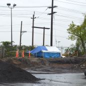 Blue tent marks where infant graves disturbed 