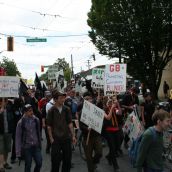 G8 rally/demo begins to make its way down Commercial 