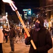 Anti-Olympic activist block traffic at Main and Hastings, Vancouver 2010