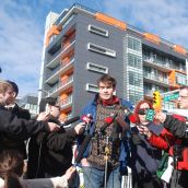 Tent City organizer Nathan Compton outside Olympic Village
