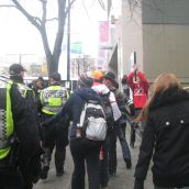 Police wouldn't let anyone with red and white enter the march