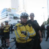 One of the demonstrators accused this cop of telling her to "go back to your own country"