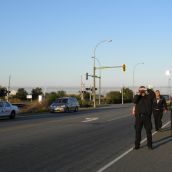 The police checkpoint, two intersections ahead of the port