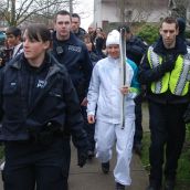 Police escort rerouted torchbearer // Murray Bush