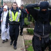 Police escort rerouted torchbearer // Murray Bush