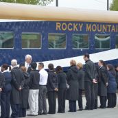 Owner Peter Armstrong (white hair) reviews the troops 