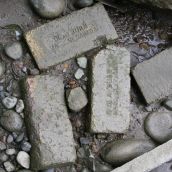 Old bricks on the beach next to cannery