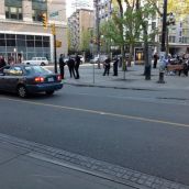 Five Cops Hang Out by Pigeon Park
