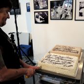 Activist Dean Wilson cuts the cake 