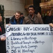 Presenting Vision Councillor Kerry Jang with demands for social housing on city-owned properties