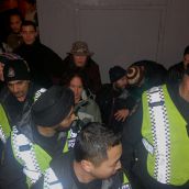 Police attempt to control front door 