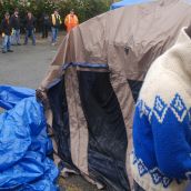 City crew watches homeless tenter pack up 