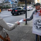 Handing out information for an online petition 