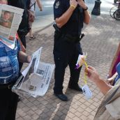 Ranting racist refuses flower, prefers paper to people