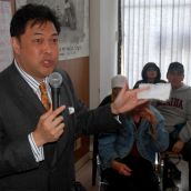City Councillor Kerry Jang with a vending ticket