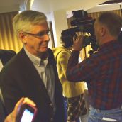 Panel members leave the hearing room.