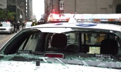 3:41:30.  Car 59 is smashed. Looking east on King Street there are very few police. 