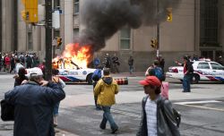 3:49:15. Car 56 in flames and to the right is Car 59