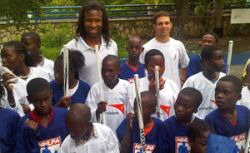 George Laraque (former NHL enforcer, vegan and animal rights activist) and Dan Hamhuis in Haiti (2).
