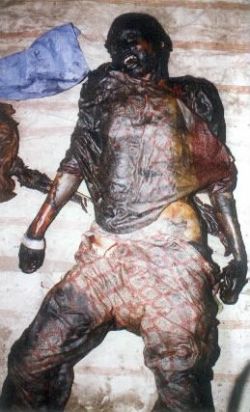 Charred remains of a Muslim woman in Gujarat state. The result of Genocide under the leadership of Narindra Modi. Charred remains of a Muslim woman in Gujarat state. The result of Genocide under the leadership of Narindra Modi.